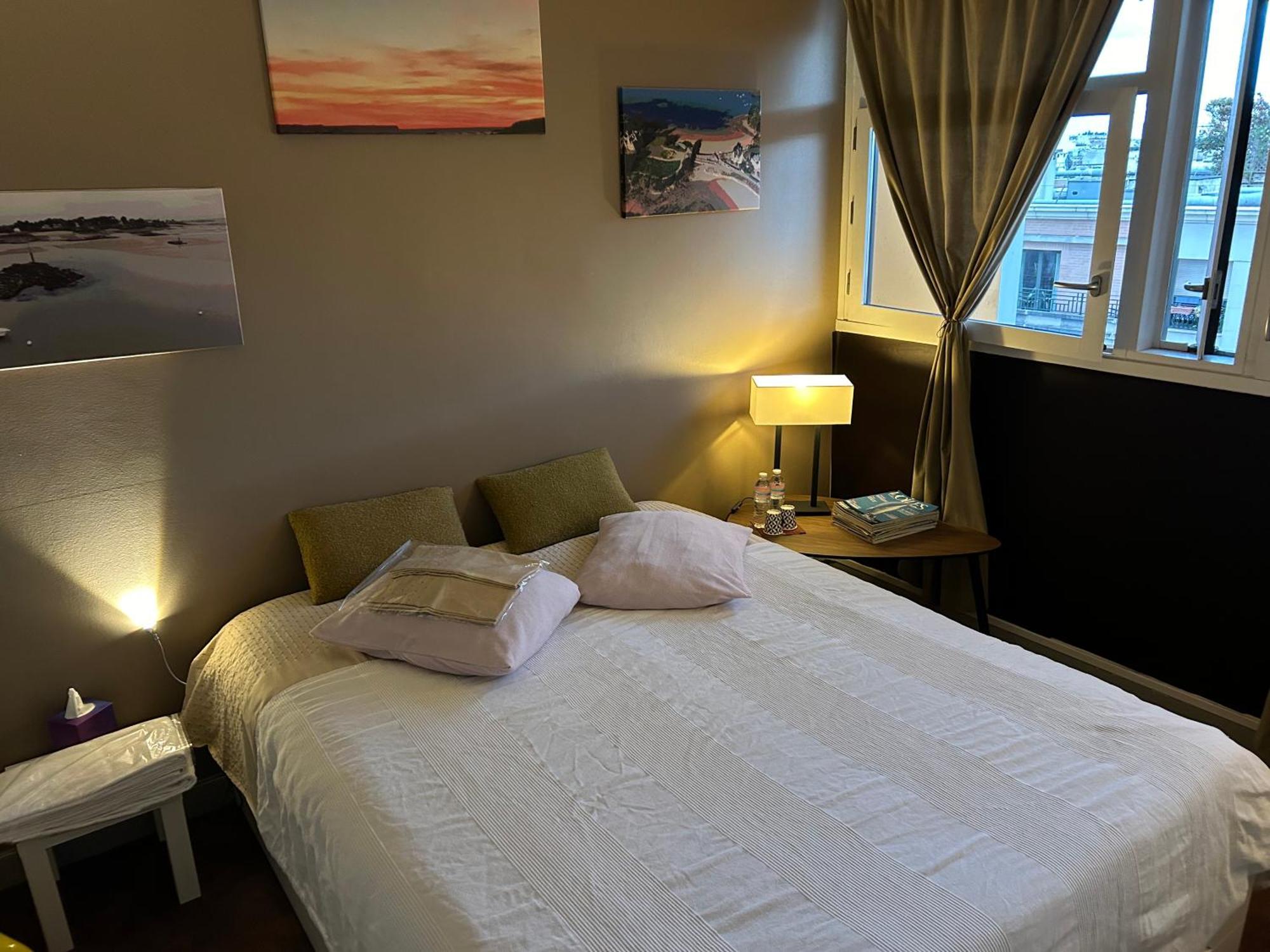 Séjour chez l'habitant A L'ombre De La Tour Eiffel Au Bord De La Seine *