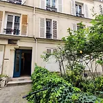 Cozy Apartment With A Garden View In The 17Th Quartier