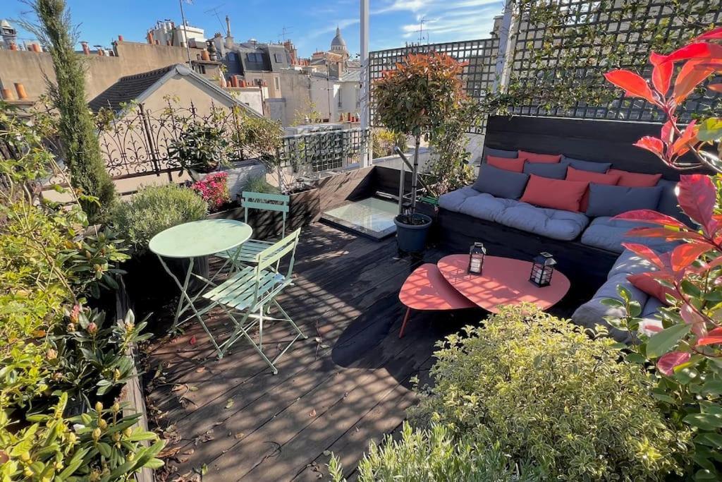 Rooftop Triplex With Garden At Notre Dame Apartment *