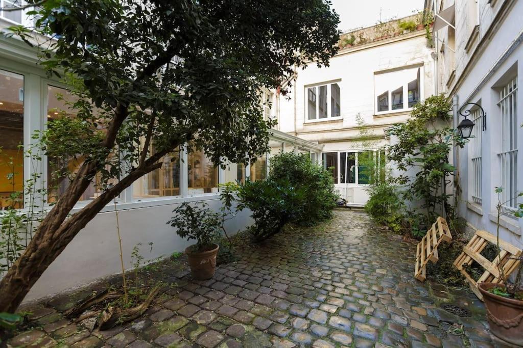 Charming In A Courtyard In