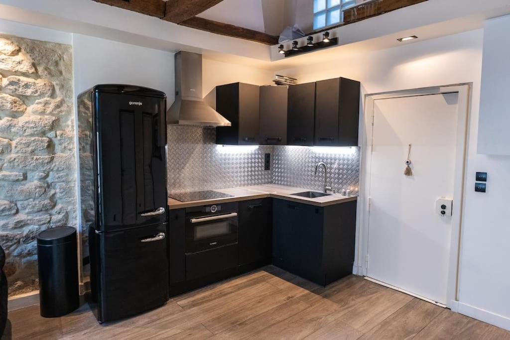 Place Des Vosges, Marais Bastille Apartment Paris