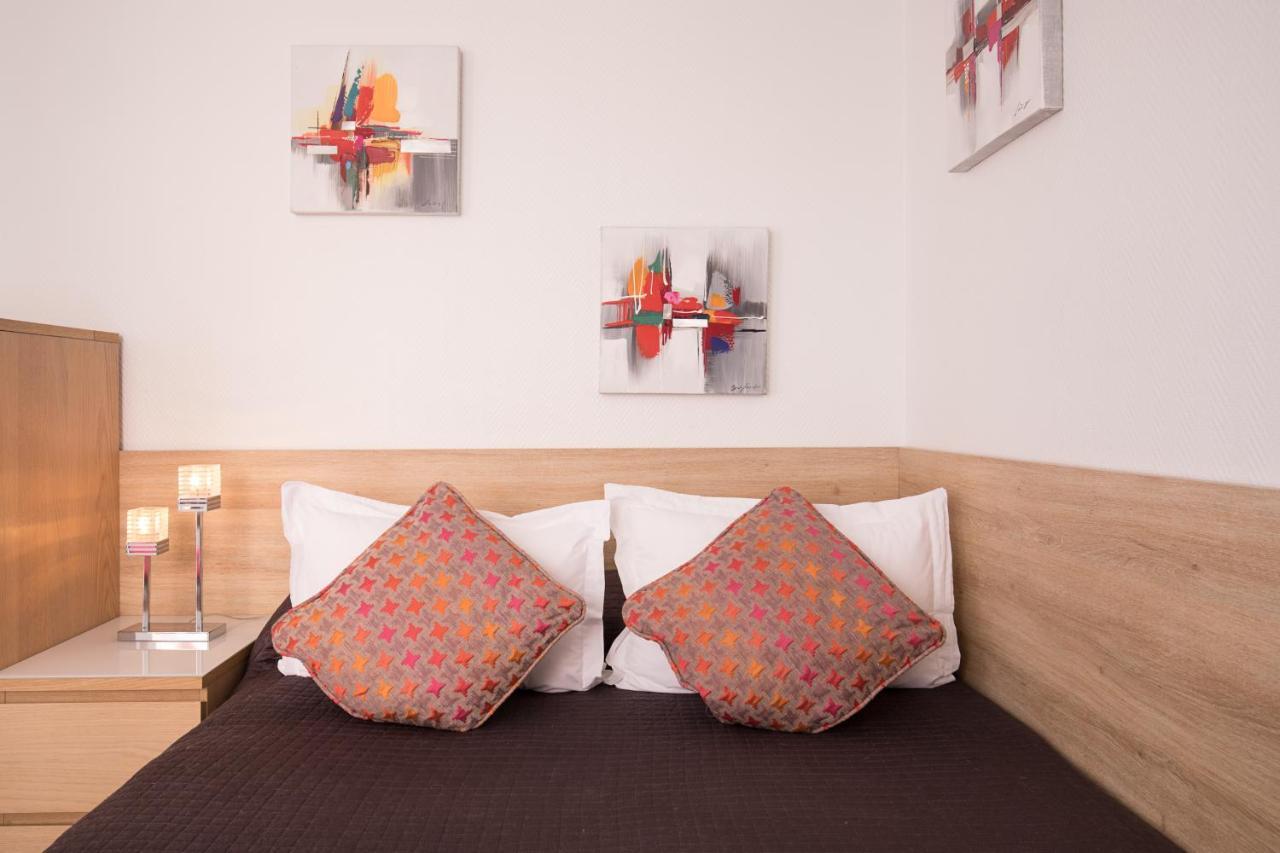 De L'horloge Aparthotel Paris