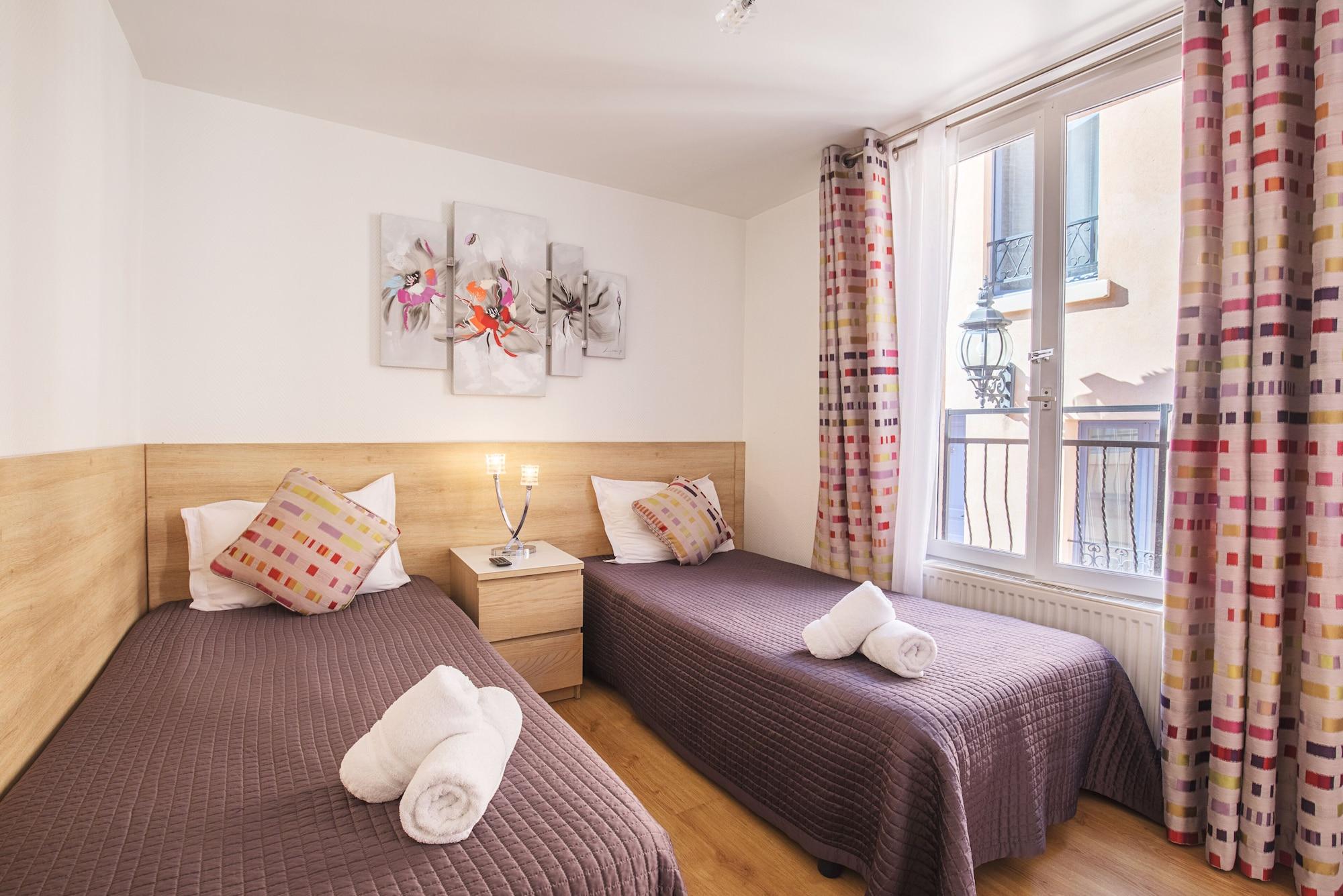 De L'horloge Aparthotel